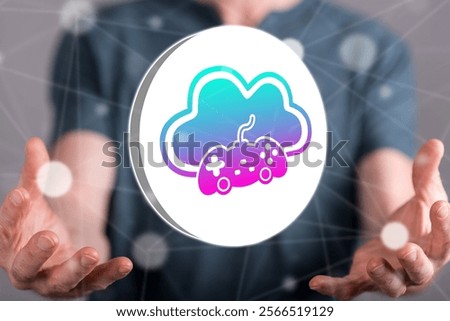 Cloud gaming concept between hands of a man in background
