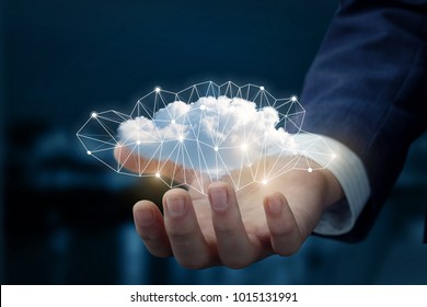 Cloud In The Hand Of Businessman. The Concept Of Cloud Service.