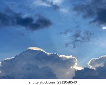 Cloud hat in the rainy season in Mae Hong Son ,Iridescent pileus cloud - Shutterstock ID 2312068543