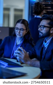 Cloud infrastructure architect debugging microservices containerization orchestration. DevOps engineer configuring kubernetes cluster deployment pipeline during critical system migration.