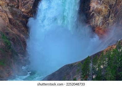 Cloud of mist at the plunge pool of waterfall, Lower Falls of the Yellowstone River. 