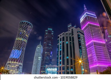 Cloud motion at night time cityscape with few famous buildings at Westbay, Doha - Qatar