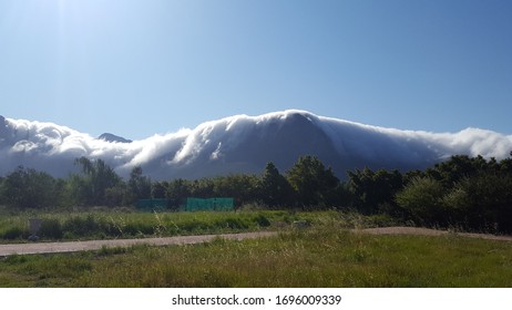 cloud moving over the mountains