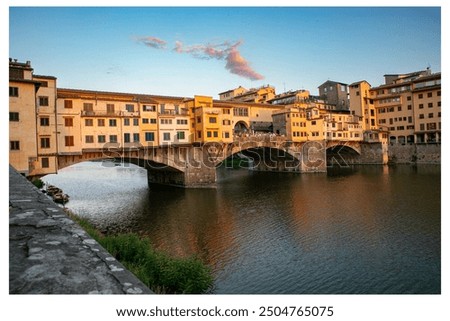A cloud over the Ponte Vecchio bridge early in the morning in Florence.