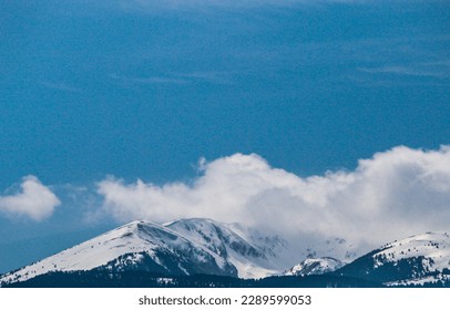 cloud over a snow mountain 