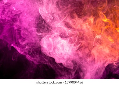 Cloud Of Pink And Orange  Smoke On A Black Isolated Background. Background From The Smoke Of Vape