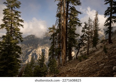 Cloud Puffs Waft through the Canyon along the Watchtower Trail in Sequoia National Park