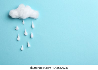 Cloud And Raindrops Made Of Cotton On Blue Background, Flat Lay. Space For Text