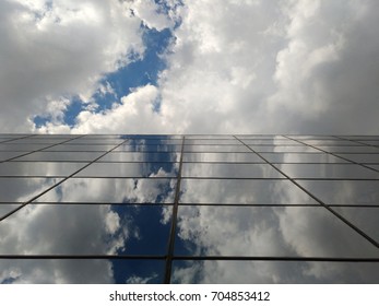 Cloud reflected in the windows of the building