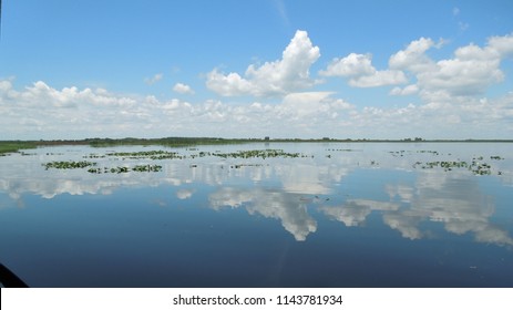 Cloud Reflection Across Lake Tohopekaliga In Florida During An Air Boat Tour.