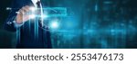 Cloud Security: Businessman holding text and icon of Cloud Security on virtual interface. Data Encryption, Access Control, Threat Detection.