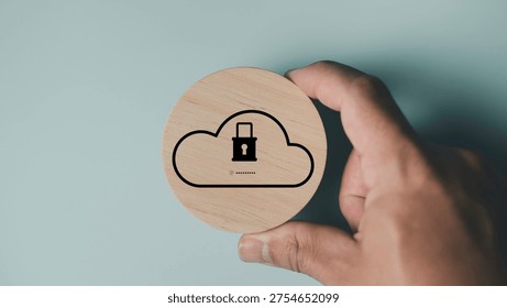 Cloud security and data protection. Hand holding cloud storage icon with padlock symbol cybersecurity, secure data access, digital privacy and cloud computing protection technology.