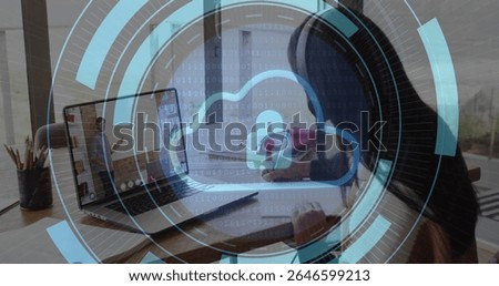 Cloud security image over person working on laptop at home. Cybersecurity, data protection, technology, remote work, home office, network安全