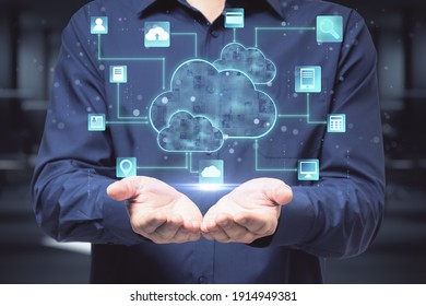 Cloud service technologies: man with opened hands and digital screen with cloud and life style signs above.