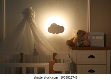 Cloud shaped night lamp in baby's room
