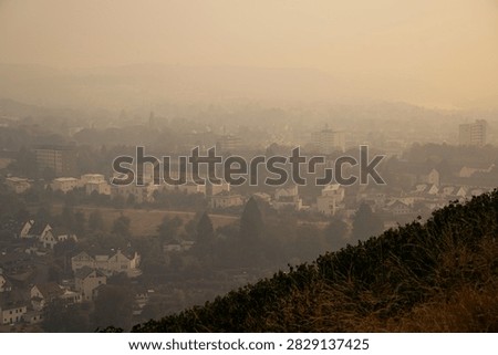 Cloud of smoke drifting toward Trier city, Germany, high fine dust levels, forest fires in High Fens, Belgium and North Rhine Westphalia, wind direction