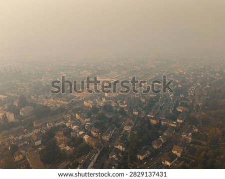 Cloud of smoke drifting toward Trier city, Germany, high fine dust levels, forest fires in High Fens, Belgium and North Rhine Westphalia, wind direction