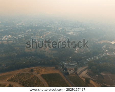 Cloud of smoke drifting toward Trier city, Germany, high fine dust levels, forest fires in High Fens, Belgium and North Rhine Westphalia, wind direction