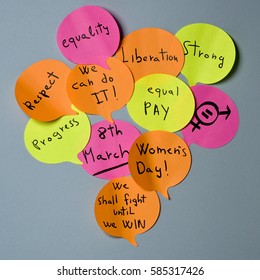 A Cloud Of Sticky Notes Of Different Colors In The Shape Of Speech Balloons With Concepts Relative To The Womens Day Written In It, Such As Equality Respect, Progress, Liberation Or Equal Pay