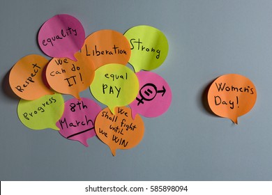 A Cloud Of Sticky Notes Of Different Colors In The Shape Of Speech Balloons With Concepts Relative To The Womens Day Written In It, Such As Equality Respect, Progress, Liberation Or Equal Pay