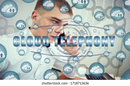 Cloud Storage Icons Flying From The Center. Hands Of A Businessman Using A Laptop With A Smartphone And The Inscription: CLOUD TELEPHONY