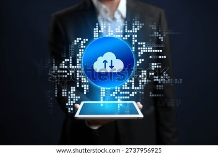 Cloud storage technology is shown on a tablet in a business setting