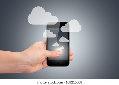 Cloud sync concept, hand holding smart phone with icons.