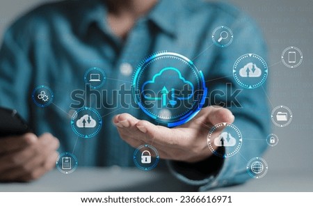 Cloud technology concept. Businessman shows cloud storage network technology icon, large network of backup platforms, online data storage for business networks with cyber security software.