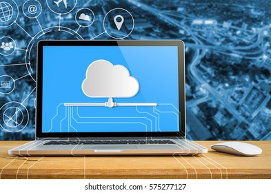Cloud technology concept, Laptop with cloud computing on table.