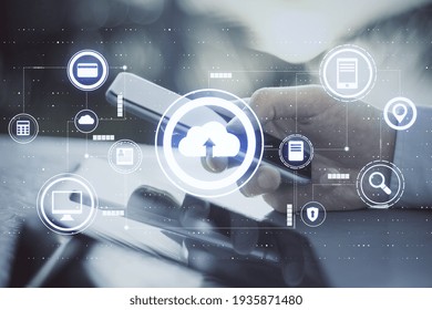 Cloud technology concept with man using smartphone and virtual screen with internet network icons. Double exposure