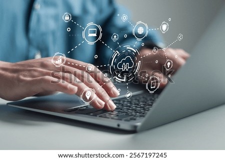 Cloud technology concept. Person using laptop with cloud storage network technology, large network of backup platforms, online data storage for business networks with cyber security software.