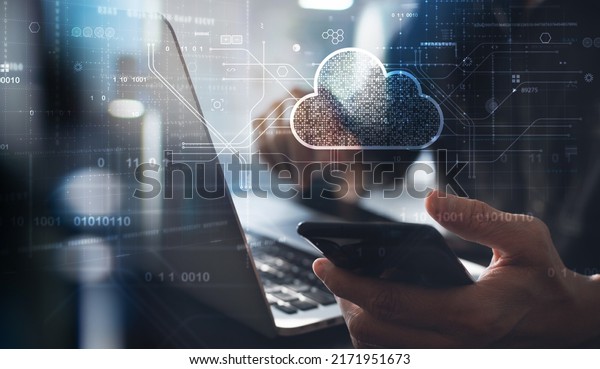 Cloud technology. Data storage\
and backup. Networking and internet service concept. Man using\
laptop computer and mobile phone with cloud computing\
diagram.