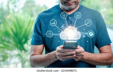 Cloud technology. Data storage. Networking server and backup database on internet service concept. businessman uses a smartphone with a cloud computing diagram display on a virtual screen. copy space