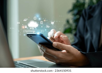 Cloud technology, Cloud data transfer and online data storage for business network, Businesswoman using smartphone with cloud computing network and icon connection data information. - Powered by Shutterstock