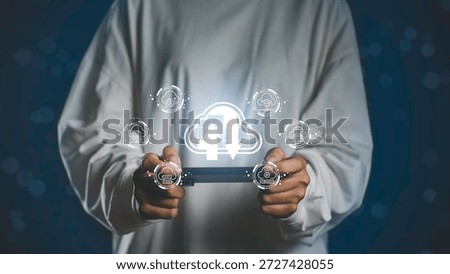 Cloud technology interface with upload and download icons illustrates digital data storage, business communication, and innovative database systems accessed through smart mobile devices.