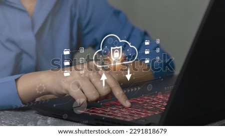cloud technology management concept Cloud with digital lock icon appears while businessman working on laptop computer Data transfer protection and security