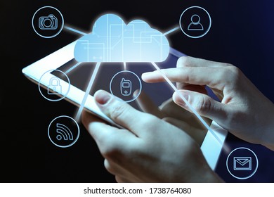 Cloud technology. Woman using tablet on dark background, closeup - Shutterstock ID 1738764080