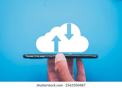 Cloud technology,Cloud technology concept.,Hand holding smartphone with cloud storage icon.