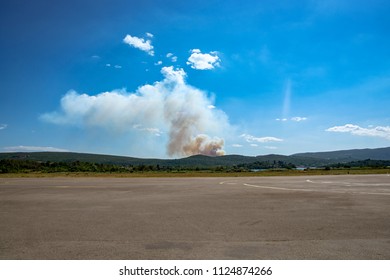Cloud of thick smoke in the mountains