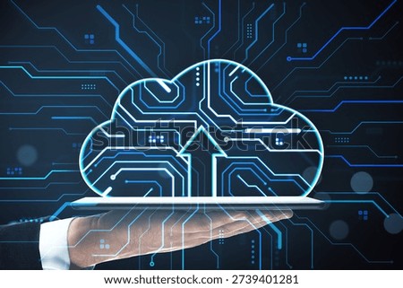 Cloud upload icon with circuit design hovering above a tablet in a person's hand on a dark abstract background, representing digital technology
