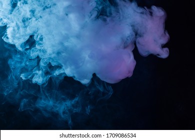 cloud of vapor. dark blue background. nobody. smoke. Underwater