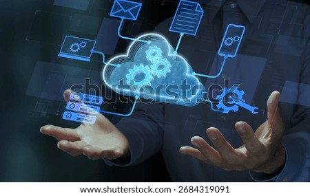 Cloud virtualization and virtual machine. Business person holding cloud and gear icons.
