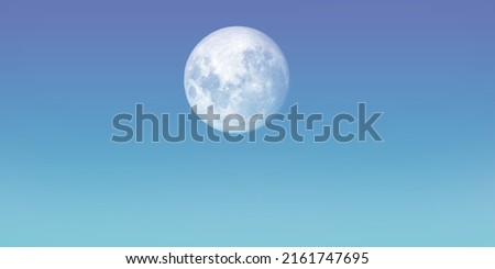 cloudless blue sky and full moon