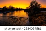 Cloudless colorful sunset on the North Platte River.