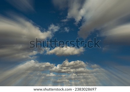 Cloudly blue sky with  speedy blurry edges