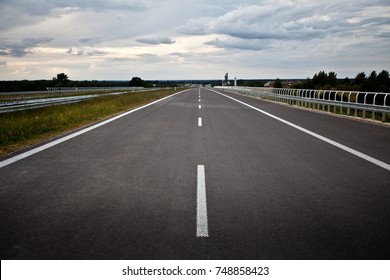 Clouds above an empty road