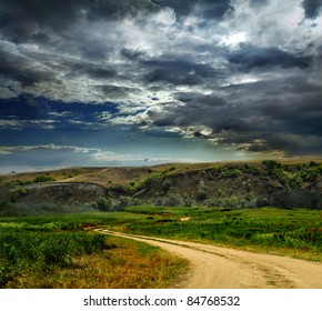 clouds above lake and trees on coast, distant mountains are showing their tops - Powered by Shutterstock