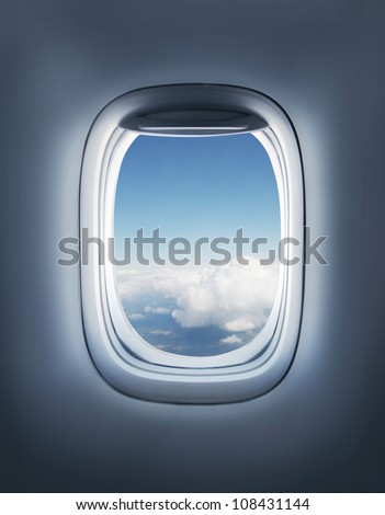 clouds in the aircraft's porthole