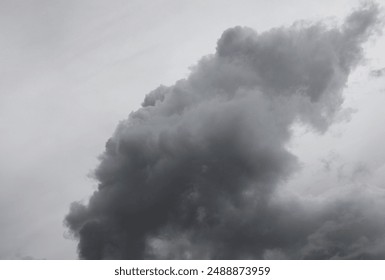 clouds background. Clouds become dark gray like a big smoke before rainfall. Thunderstorm is a storm with lightning and thunder. storm. raincloud dark motion. Black and white Cloudy sky.