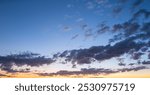 Clouds background. Dramatic Clouds Sunset Background. Sky with clouds in Sunrise. Sunrise with clouds in various shapes background. Calm Cloud.